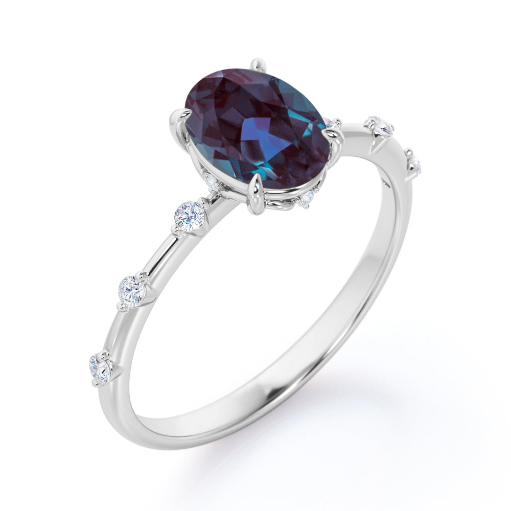Twig style 1.1 carat Oval shaped Lab made Alexandrite and diamond nature inspired engagement ring in Black gold
