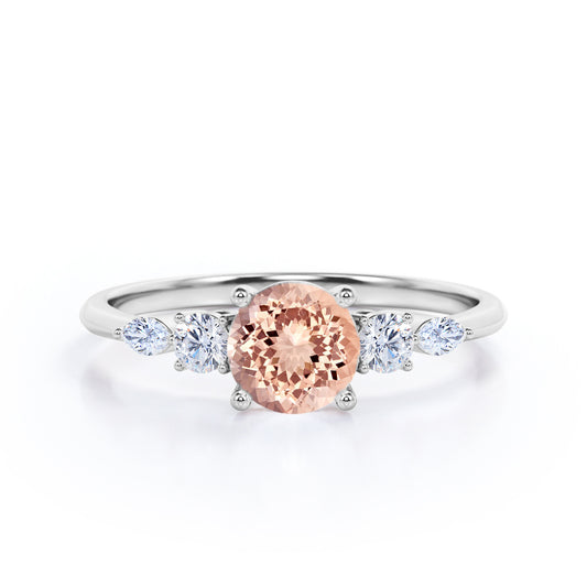 Traditional 1.1 carat Round cut Morganite and diamond five stone engagement ring in White gold