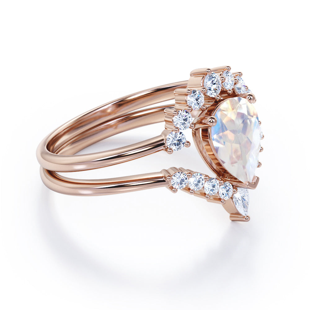 Artisan 1.45 carat Brilliant Pear Blue Moonstone and diamond contoured wedding ring set for women in Rose gold