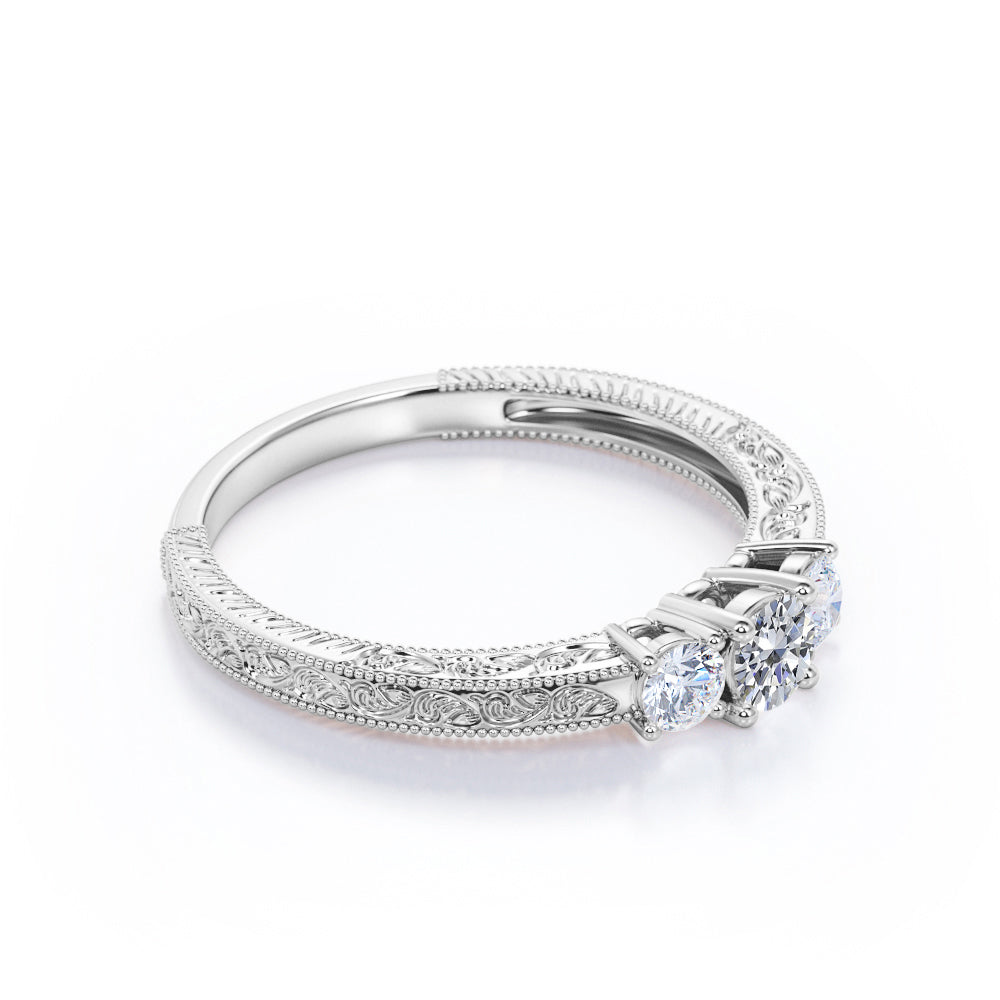 Three stone 0.49 carat Round cut Diamond Filigree Engagement ring in Gold