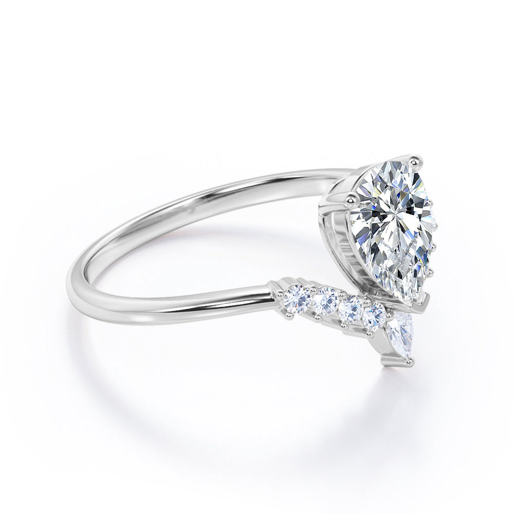 Antique V-shaped 1.15 carat Pear cut Moissanite and diamond engagement ring in White gold