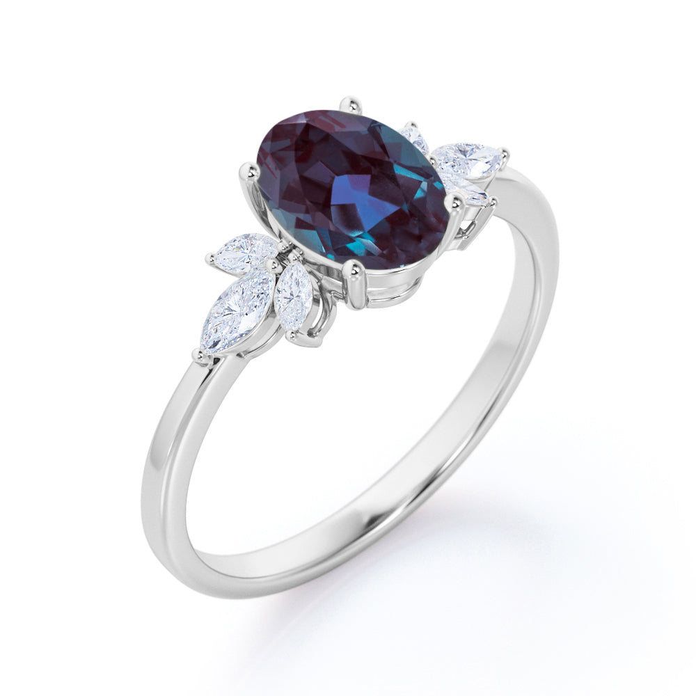 Artistic Flower patterns 1.1 carat Oval shaped Alexandrite and diamond marquise engagement ring in White gold