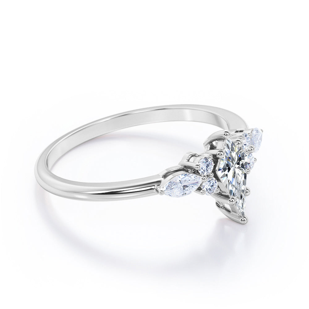 Classic seven stone 1.15 carat Kite shaped Moissanite and diamonds 6 prong setting engagement ring in White gold