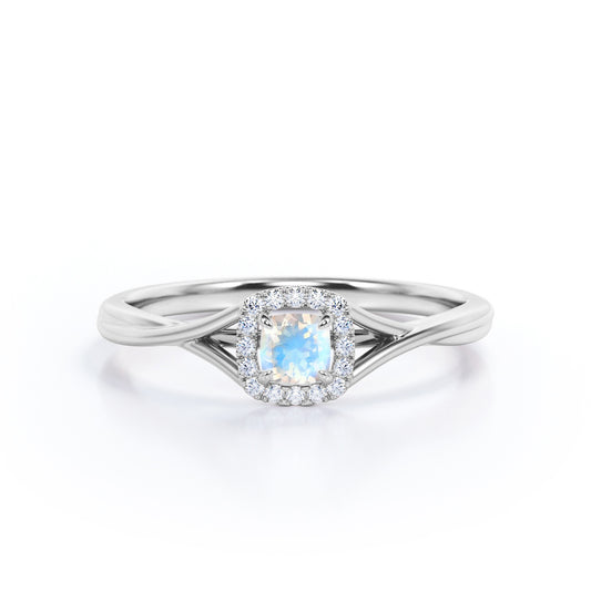 Minimal Twist Shank 0.75 carat Cushion Cut Blue Moonstone and diamond floral halo engagement ring in White gold