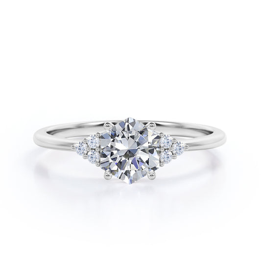 Modern 1 carat Hexagonal Moissanite and diamond tapered knife edge engagement ring in White gold