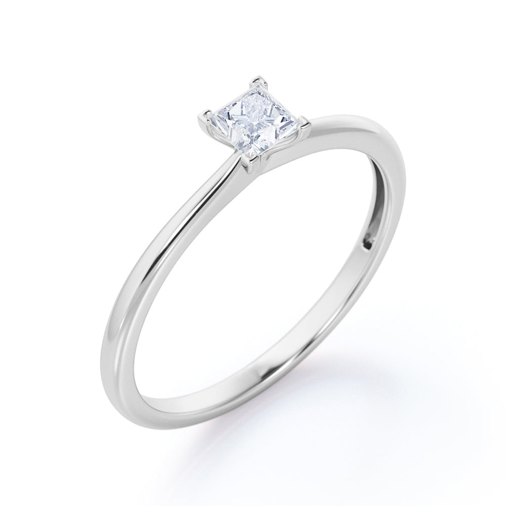 Elegant Solitaire 0.5 carat Princess cut Moissanite-cathedral setting-tapered shank engagement ring in White gold