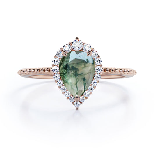 Royal inspired 1.2 carat Pear shaped Moss Green Agate and diamond Milgrain and halo engagement ring in Rose gold