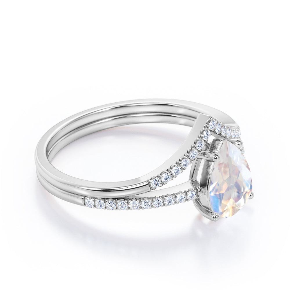 Magnificent 1.5 carat Pear cut Moonstone and diamond V-shaped wedding ring set in White gold