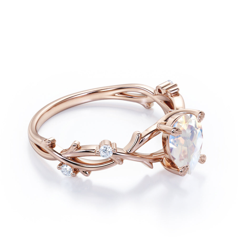 Forest themed Design 1.1 carat Pear cut Moonstone and diamond branchlet engagement ring in Rose gold