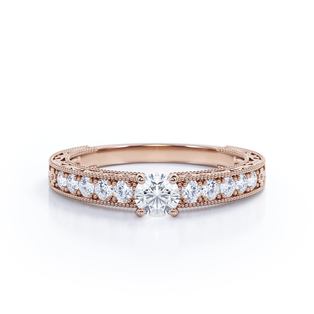 Victorian style 0.6 carat Round cut Moissanite and diamond Milgrain and filigree engagement ring in Rose gold