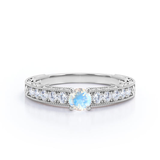 Art deco Cathedral 1.25 carat Round cut Blue Moonstone and diamond Milgrain and Filigree engagement ring in White gold