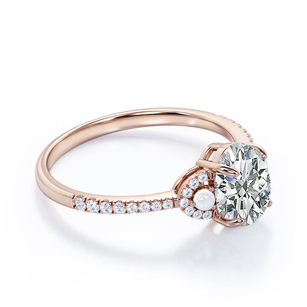 Vintage crescent style 1.35 carat Oval cut Moissanite, diamonds and freshwater pearl engagement ring in Rose gold