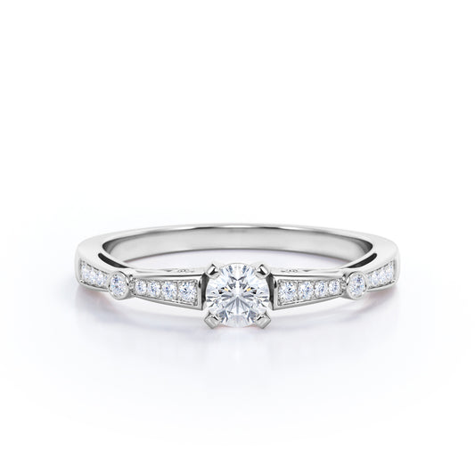 Elegant Baguette style 0.75 carat Round cut Moissanite and diamond channel setting engagement ring in White gold