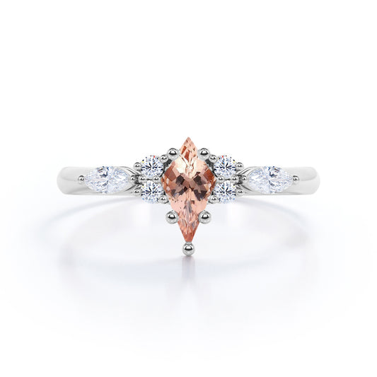 Trendy 1.25 carat Kite shaped Morganite and diamond button prong setting-seven stone promise ring for women in White gold