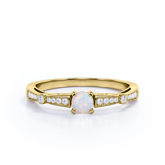Artistic 0.66 carat Round cut Natural Ethiopian Opal and diamond art deco style engagement ring in Yellow gold