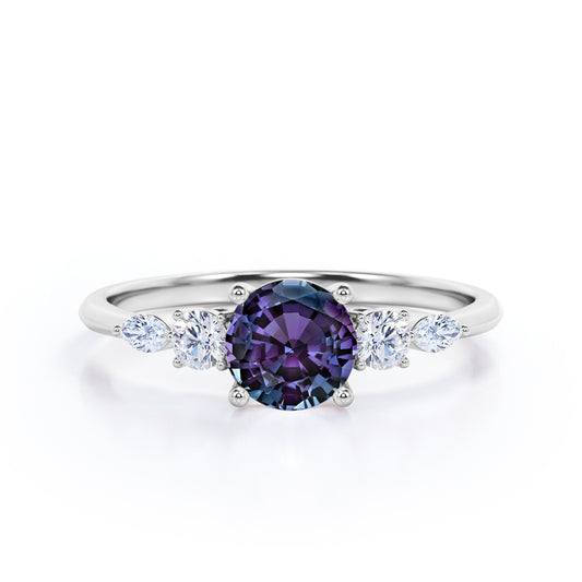 Button Prong style 0.65 carat Round cut Synthetic Alexandrite and diamond five stone engagement ring in White gold