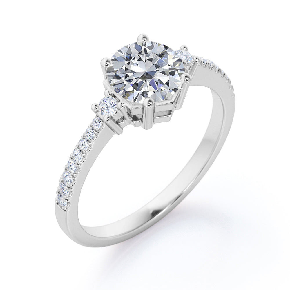 Antique Pave set 1.25 carat Round cut Moissanite and diamond 3 stone engagement ring in White gold